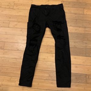 Women’s destressed black jeans
